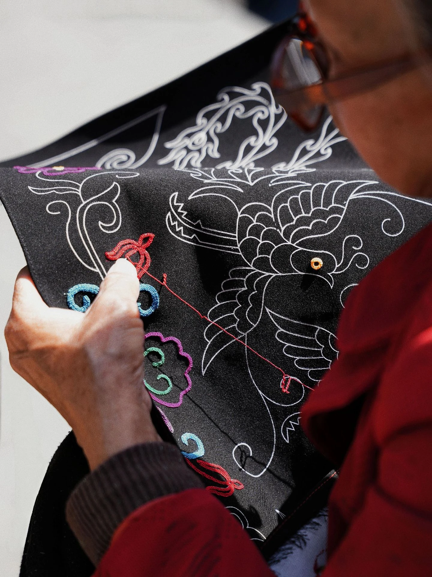 Hand embroidery process for traditional Miao textile