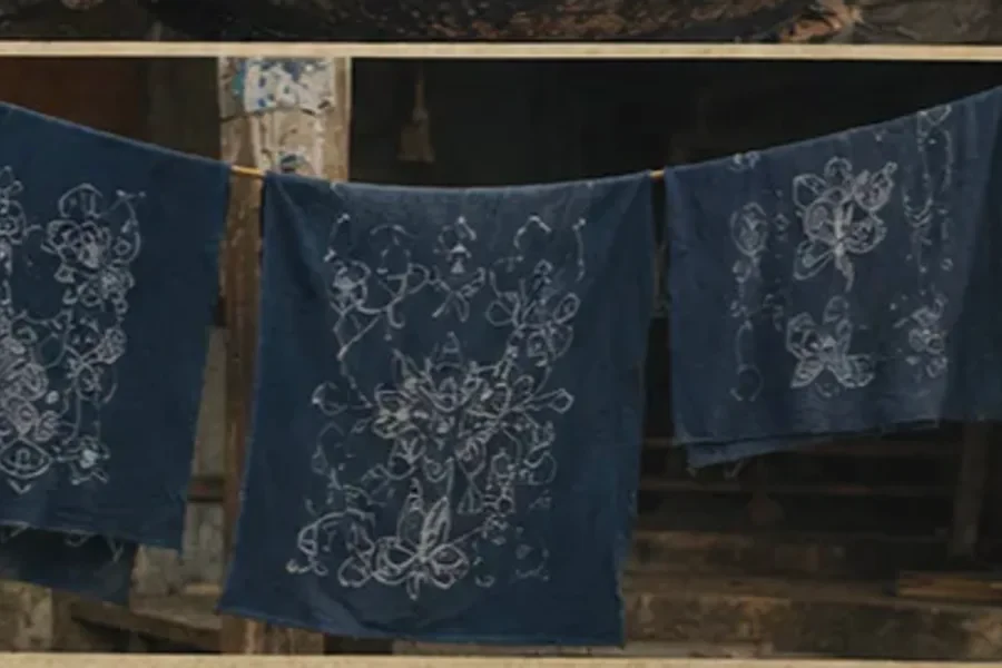 Finished indigo batik cloth hanging after washing