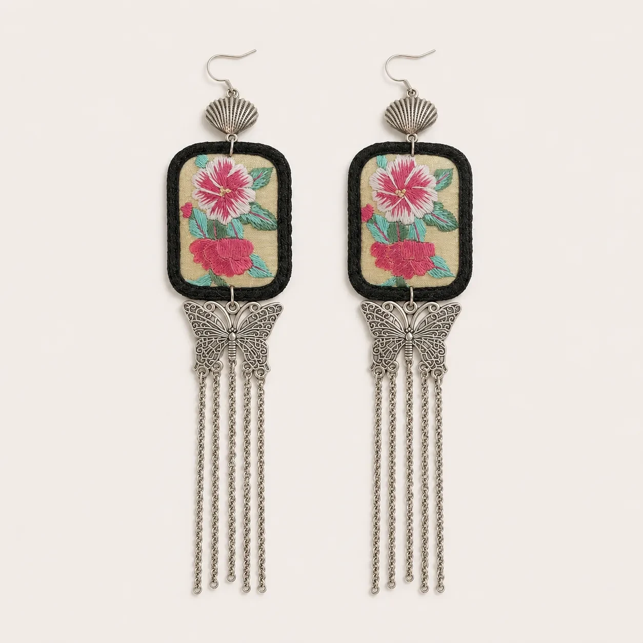 Suspended metal elements on real textile statement earrings