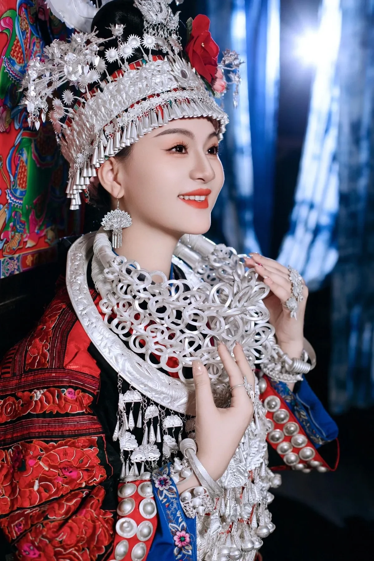 Shidong Miao traditional dress showing portrait silver collar.