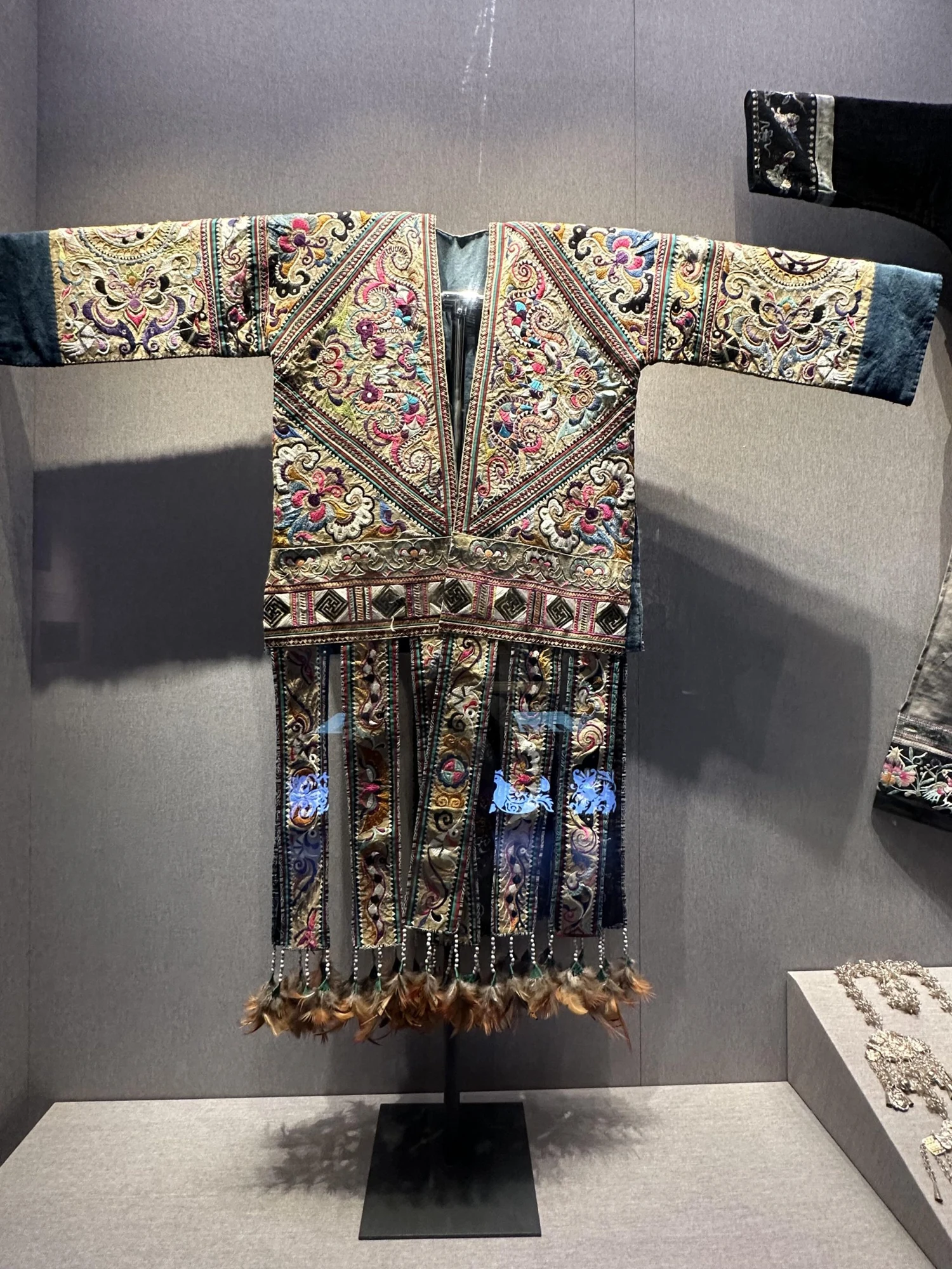 Traditional Miao garment with butterfly-inspired embroidery